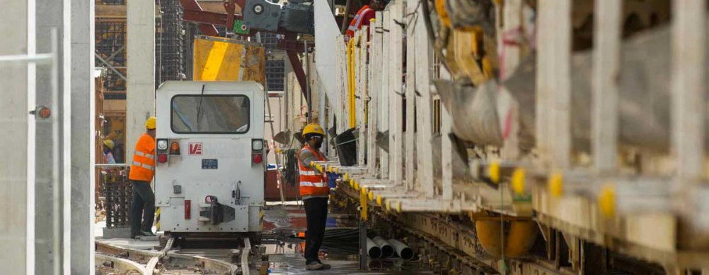 Deux ouvriers QDVC en poste sur un chantier